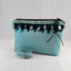 bandolera azul plumas y lágrimas perladas
