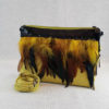 bandolera amarilla plumas